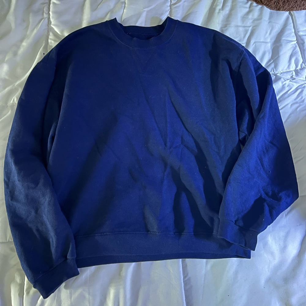 Medium blue pullover sweater.